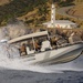 US Coast Guard Maritime Safety and Security Team (MSST) 91114 patrols the coastline of Guantanamo Bay