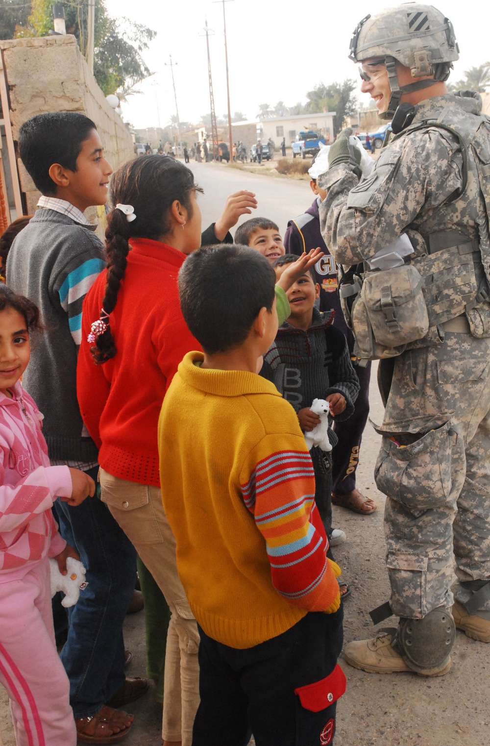 USD-C Soldiers, Iraqi Police provide for families in need