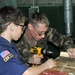 Seabees and Boy Scouts Team Up for Pinewood Victory