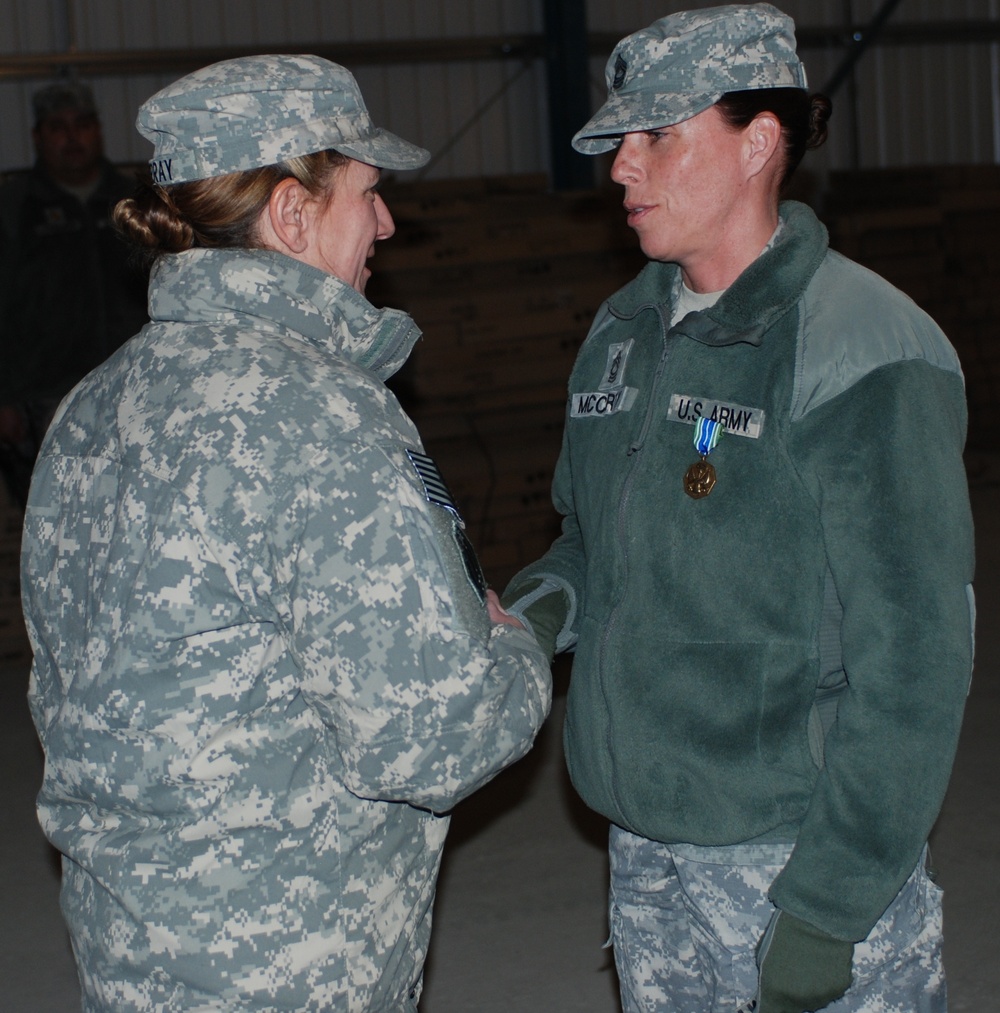 Michigan National Guard soldier, Master Sgt. Kathleen McCarty, recieves award