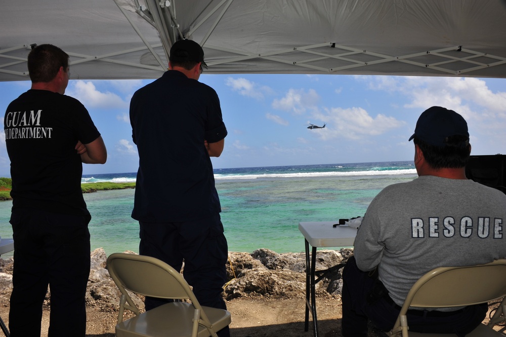 US Coast Guard, U.S. Navy, Guam Fire Department, Guam Police Department search for missing fishermen