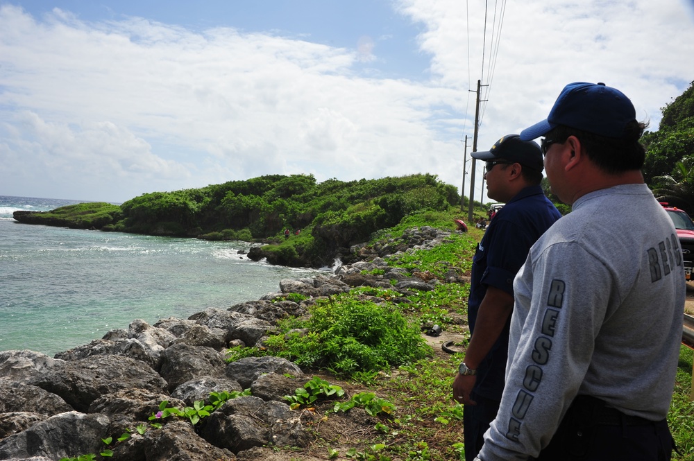 U.S. Coast Guard, U.S. Navy, Guam Fire Department, Guam Police Department search for missing fishermen