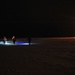 Coast Guardsmen practice ice rescue in the dark