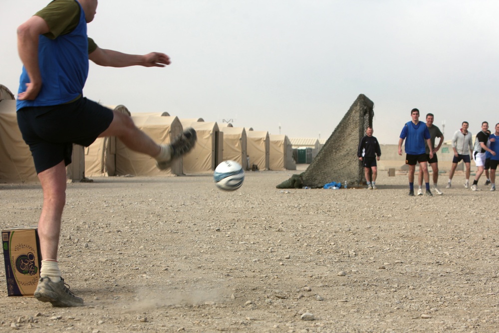 US and UK troops play friendly soccer game