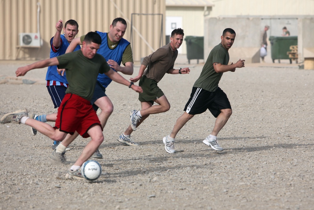 US and UK troops play friendly soccer game