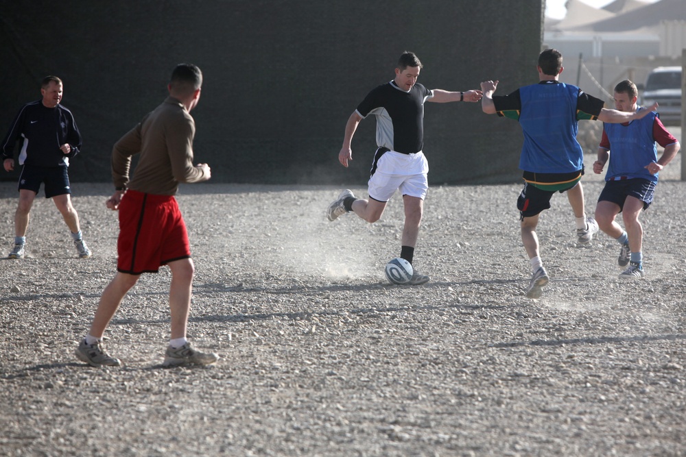 US and UK troops play friendly soccer game