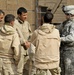 Sgt. Meegan speaks with Iraqi soldiers