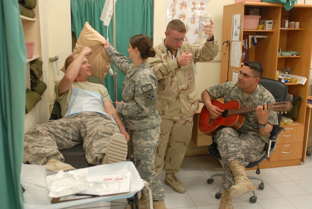 The sounds of a patriot: Soldier sings and strums the strings of morale