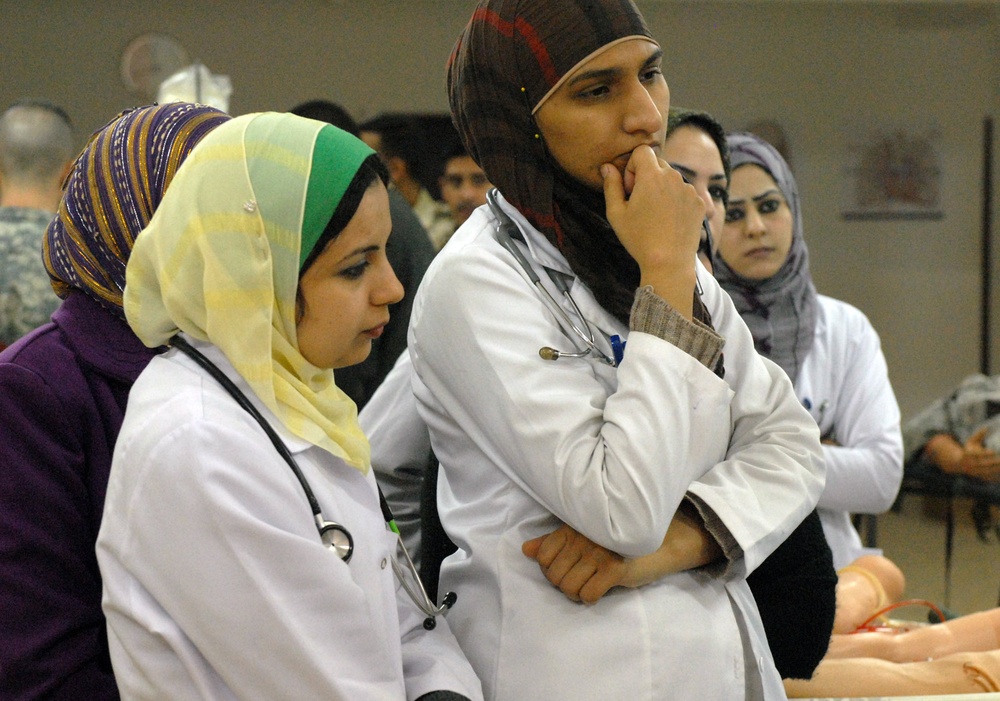 USD-C medical personnel teach trauma care course to Ramadi doctors to help save lives