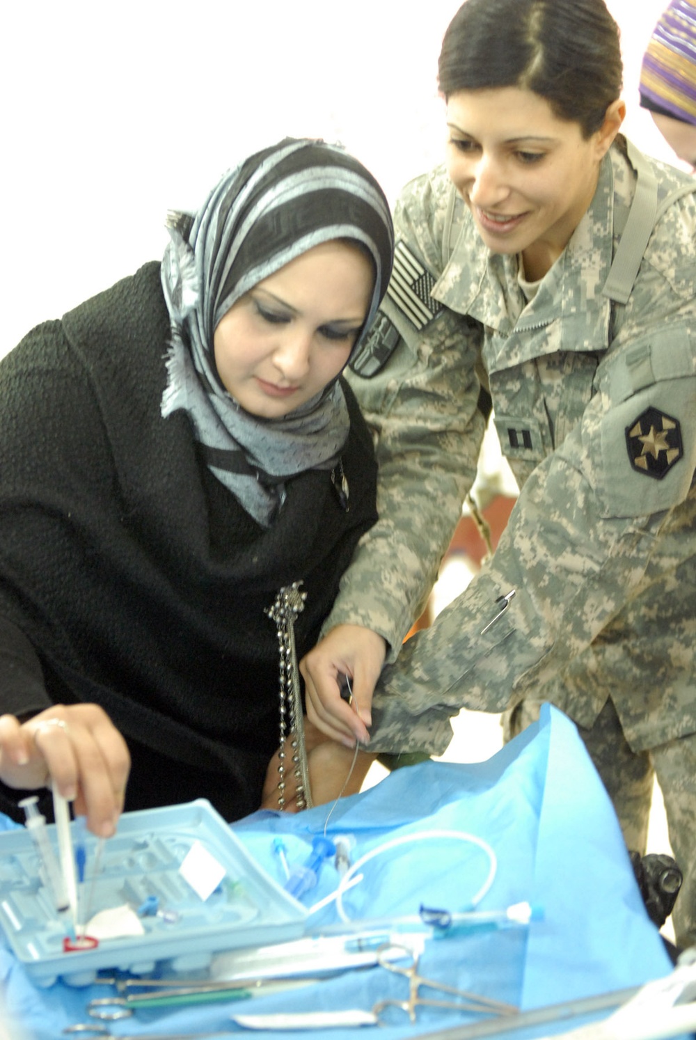 USD-C medical personnel teach trauma care course to Ramadi doctors to help save lives