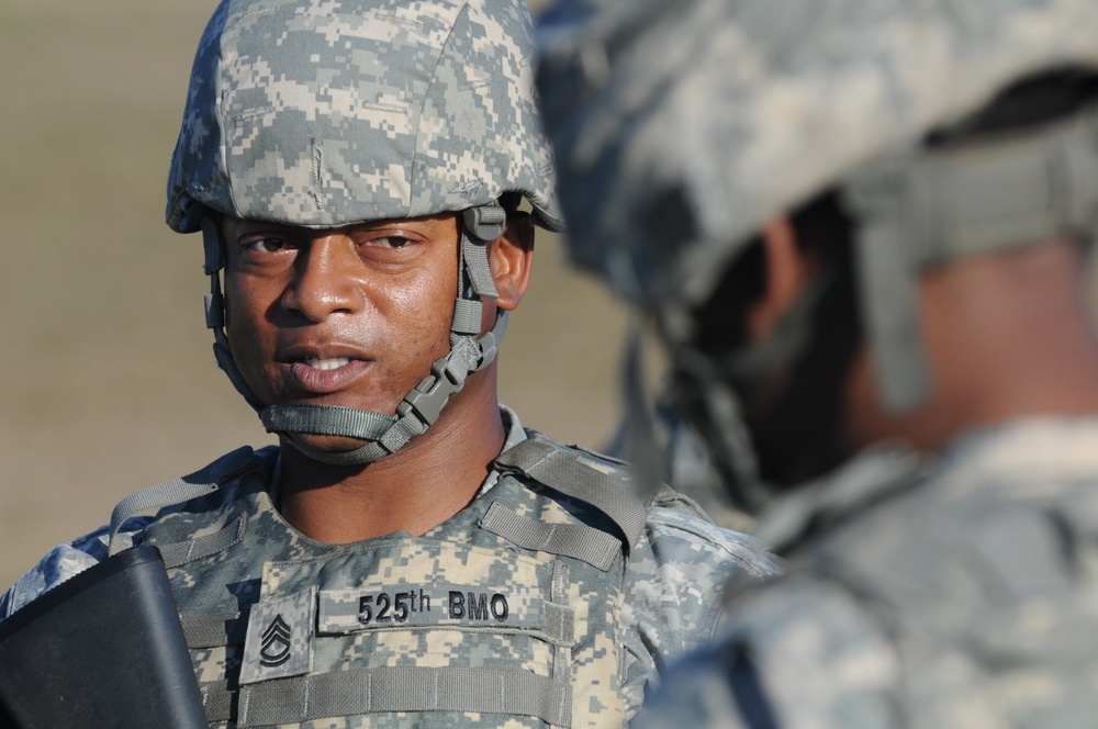 Sgt. 1st Class Vernon Watson briefs a Soldier during a  525th Military Police Battalion training in Guantanamo Bay