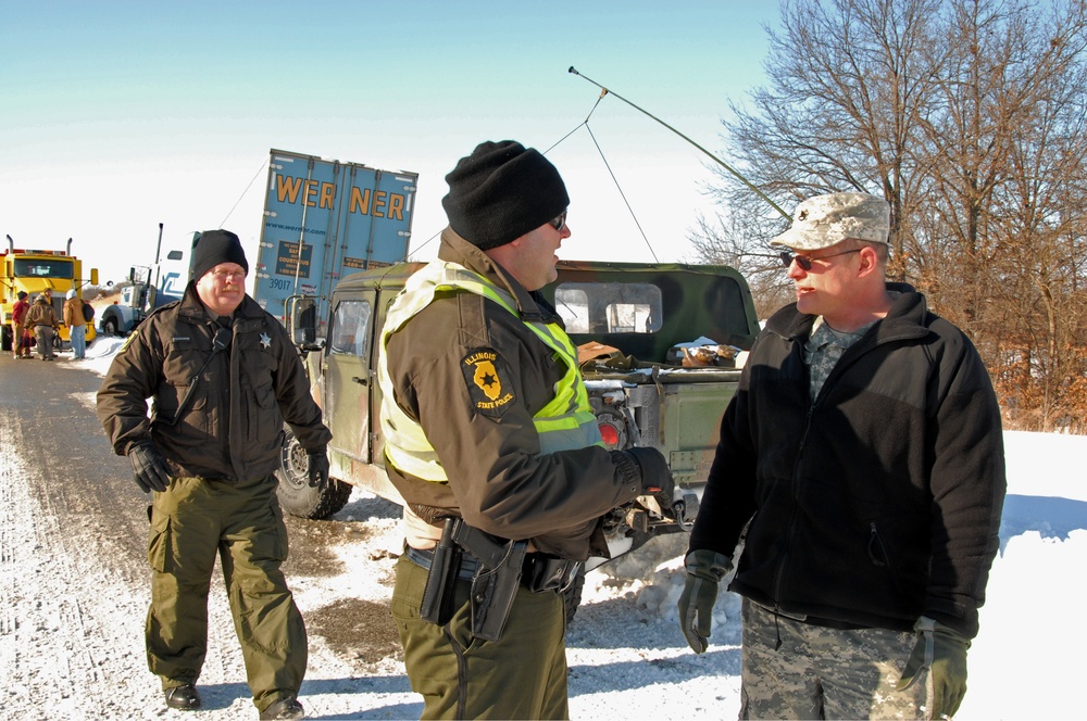 Illinois National Guard, State Troopers work to assist stranded motorists