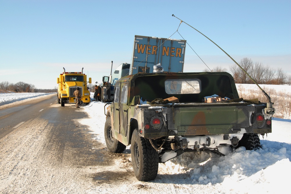 Illinois National Guard, State Troopers work to assist stranded motorists
