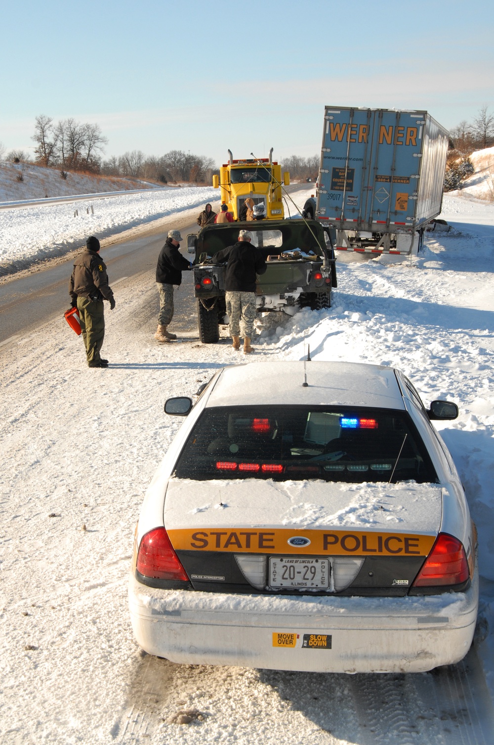 Illinois National Guard, State Troopers work to assist stranded motorists