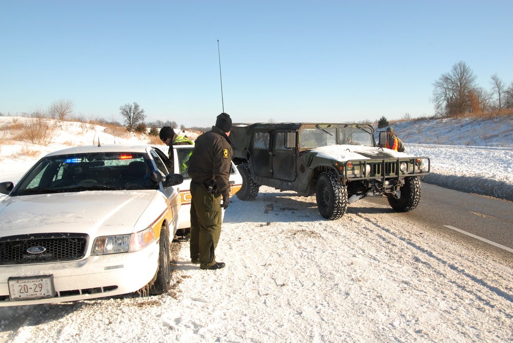 Illinois National Guard, State Troopers work to assist stranded motorists