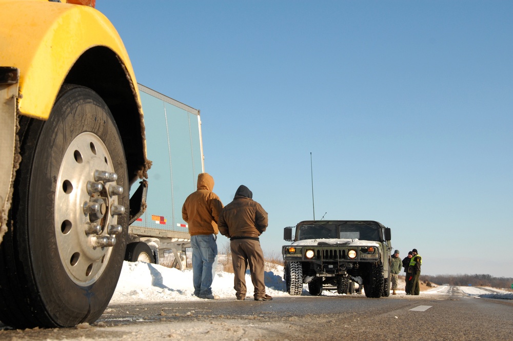 Illinois National Guard, State Troopers work to assist stranded motorists