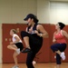 Adding kick to workout: High-energy kickboxing challenges participants