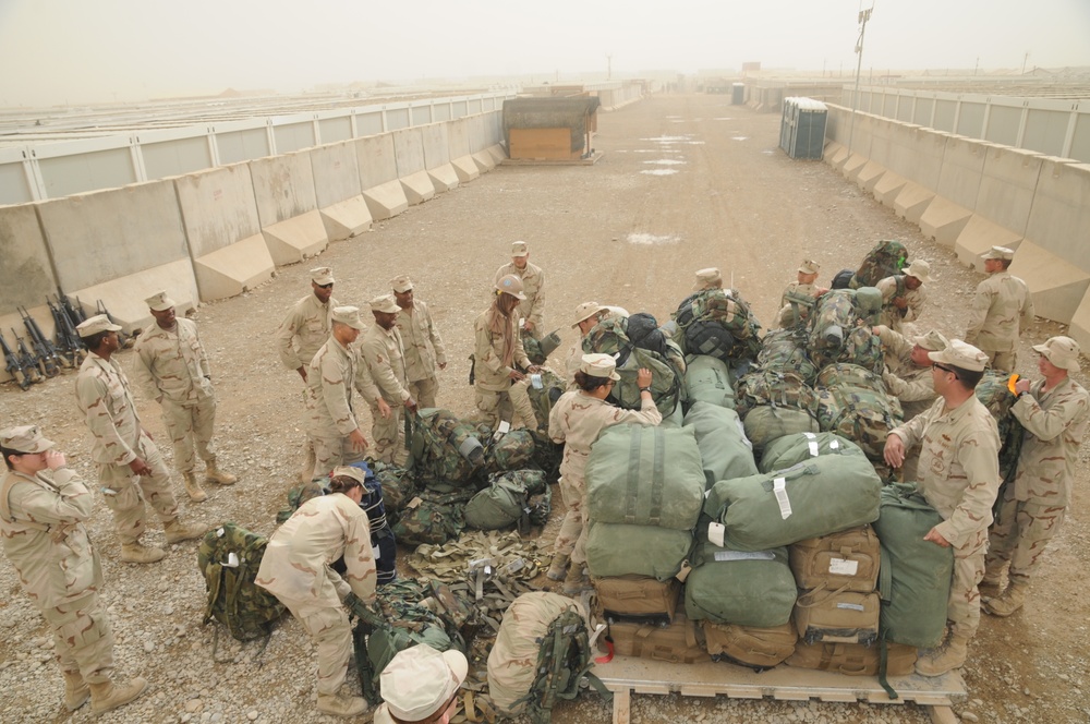 Seabees Work Together to Pack for a Flight