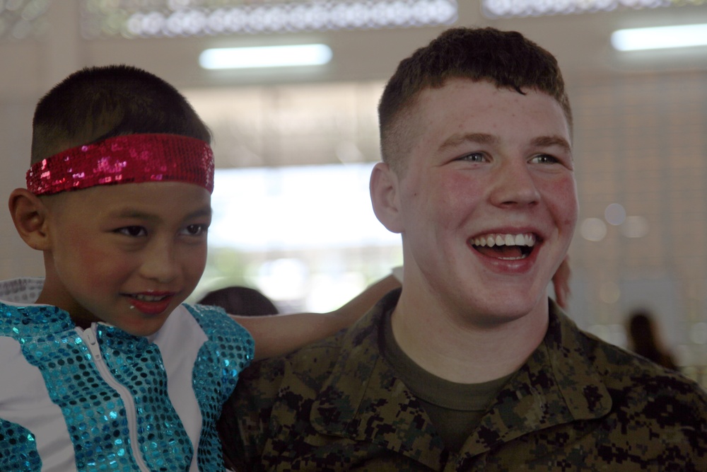 Marine Aircraft Group 36 Marines visit disabled children during Cobra Gold 2011