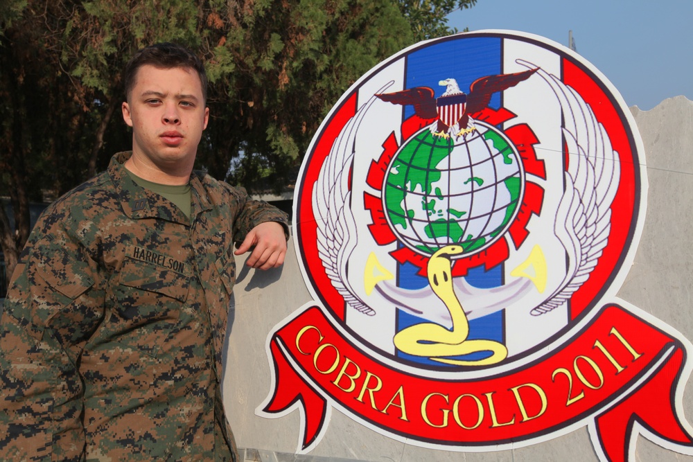Sailor helps coordinate community relations projects, develops professionally during Cobra Gold 2011