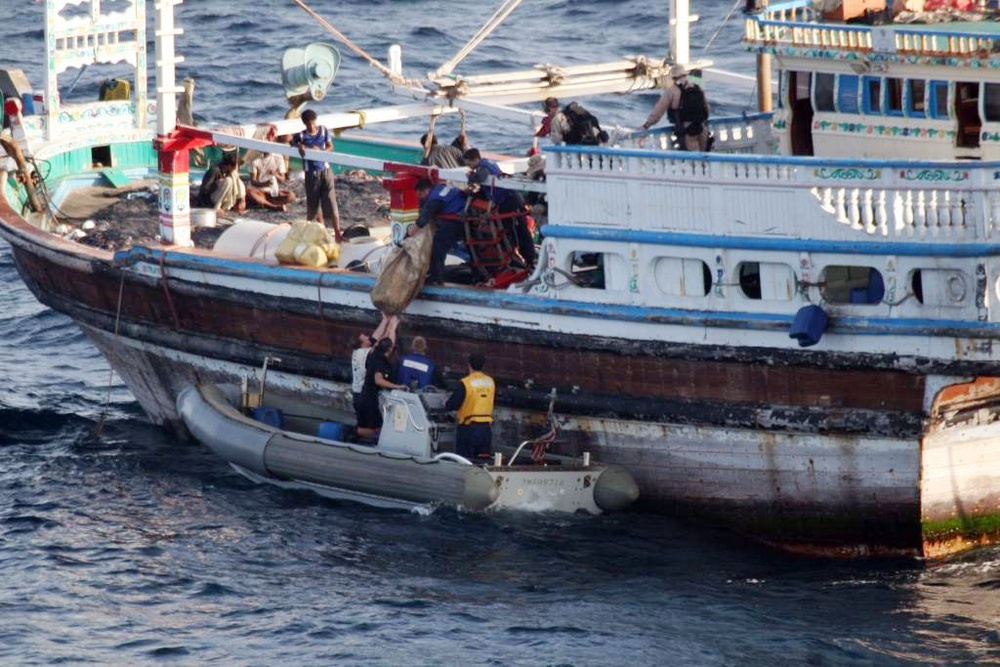 USS Cape St. George Assists Fishing Boat