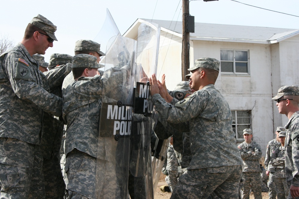Military Police rehearse riot control procedures