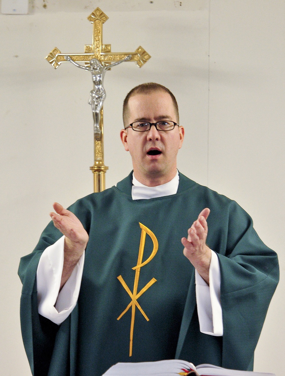 Father Magnuson gives sermon