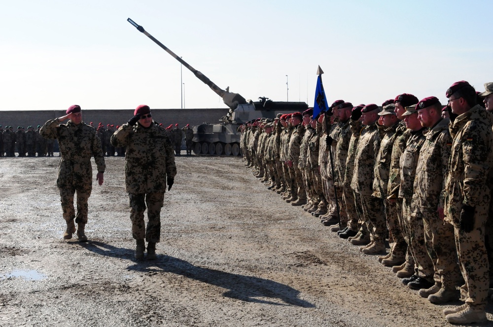 TF Kunduz outgoing commander and ISAF RC-North commander review troops at change of command