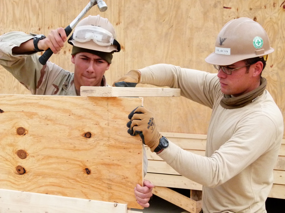 Sailors from U.S. Navy Mobile Construction Battalion 40 build new facilities at FOB Ghowrmach