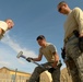 Members of U.S. Air Force 877th Expeditionary Prime Beef Squadron prepare to erect an Alaskan Small Shelter System at FOB Ghowrmach