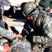 New Mexico National Guard medics practice treating soldier during exercise