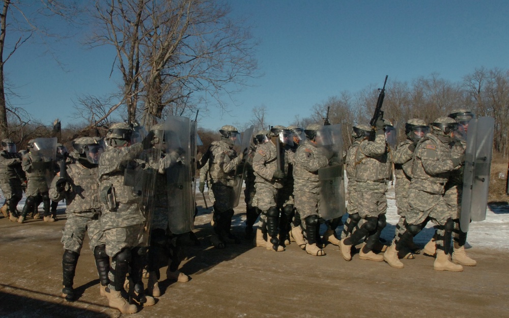 New Mexico National Guard infantry soldiers practice riot control techniques