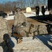 New Mexico National Guard medics carry simulated injured soldier during riot control exercise