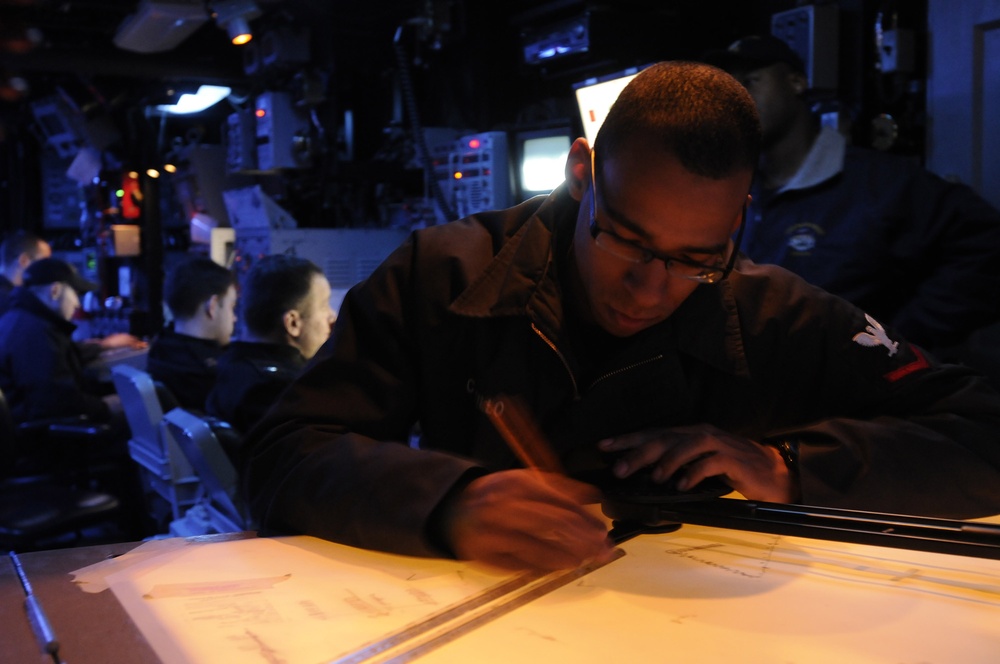 USS Blue Ridge Sailor Plots Course