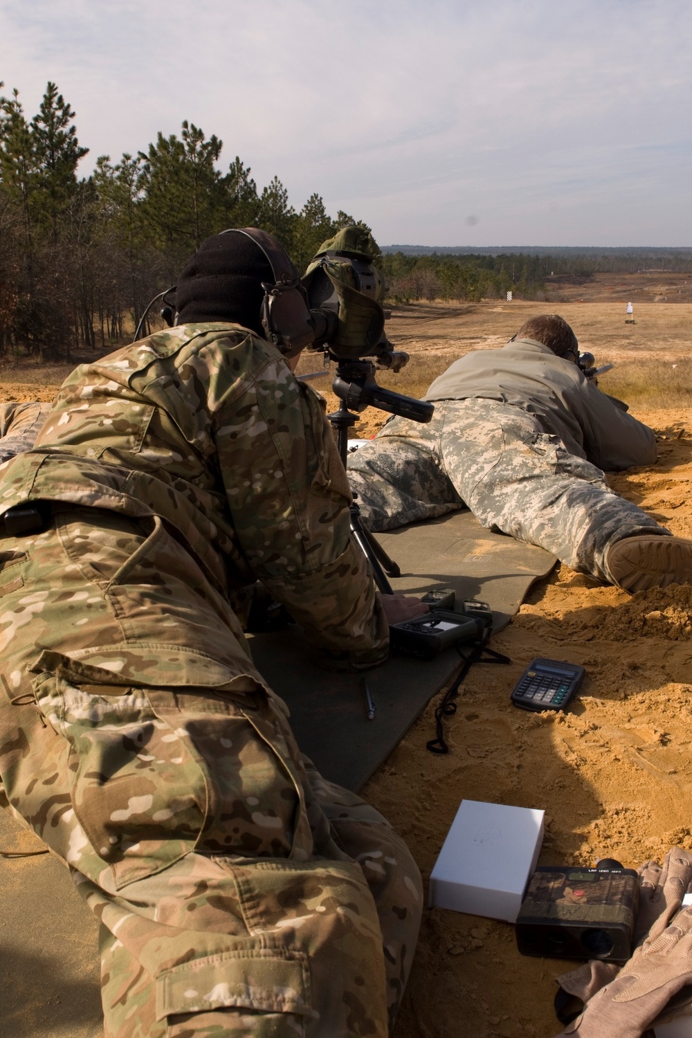 Special Forces Sniper Course students prepare to fire.