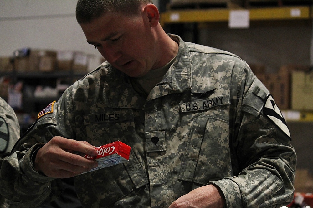 1st ACB helps stock care packages for deployed troops