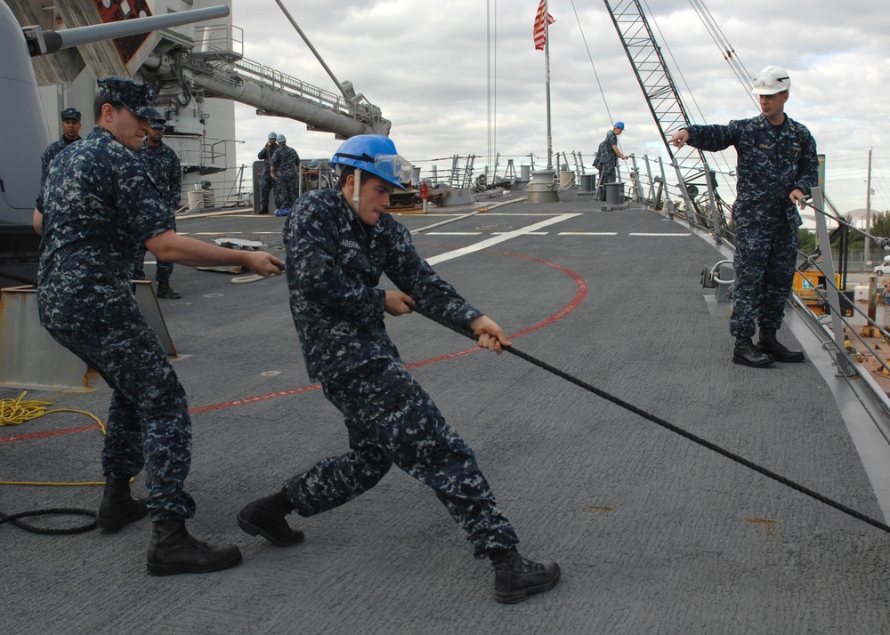 USS Mitscher Sailors Heave a Line