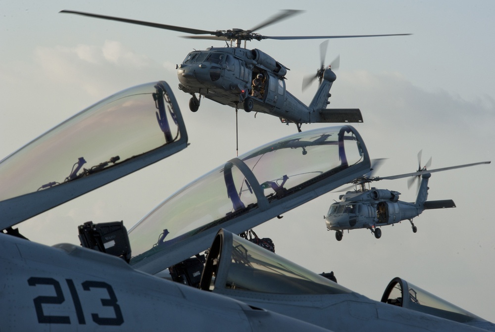 MH-60 Sea Hawks Deliver Stores to USS Carl Vinson