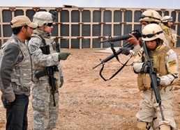 Staff Sgt. Limbocker instructs IA jinood.