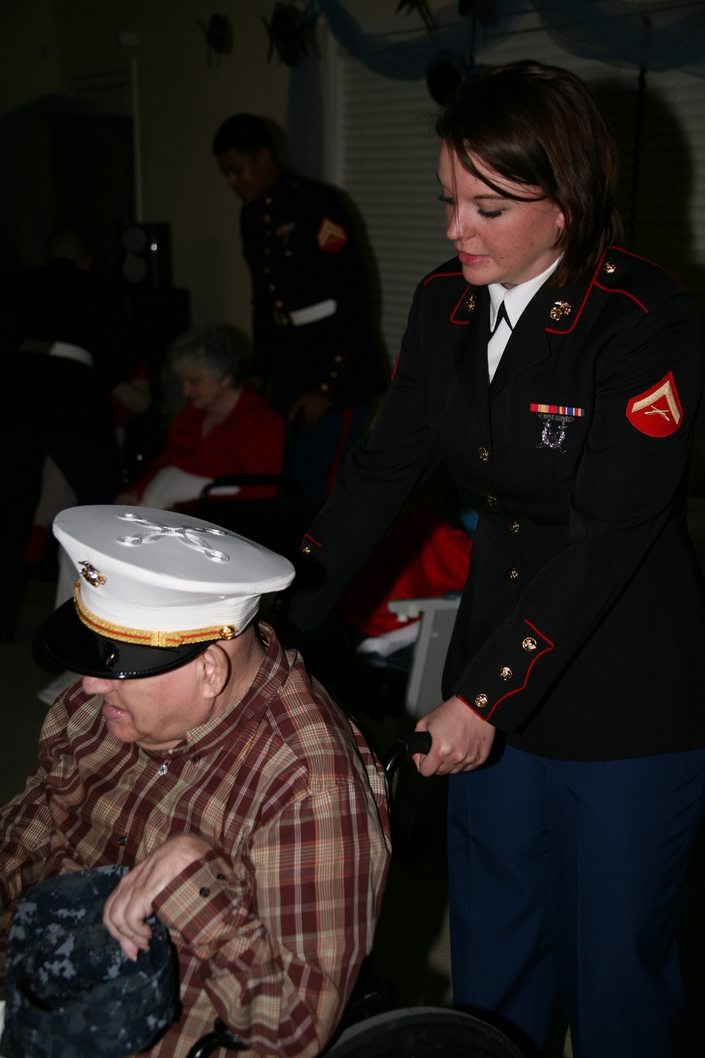 Marines volunteer as Valentine dates for elderly