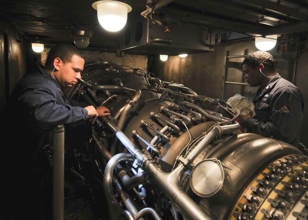 USS Anzio Sailors Check Gas Turbine Engine