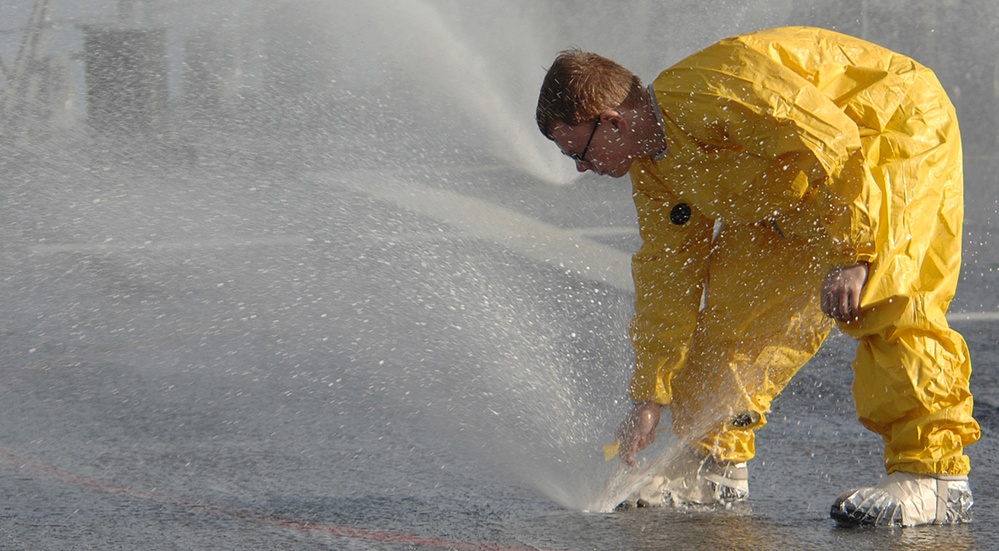 USS Mitscher Sailor Checks Sprinkler