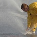 USS Mitscher Sailor Checks Sprinkler