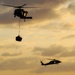 MH-60S Sea Hawks Transfer Ammunition Above the Atlantic