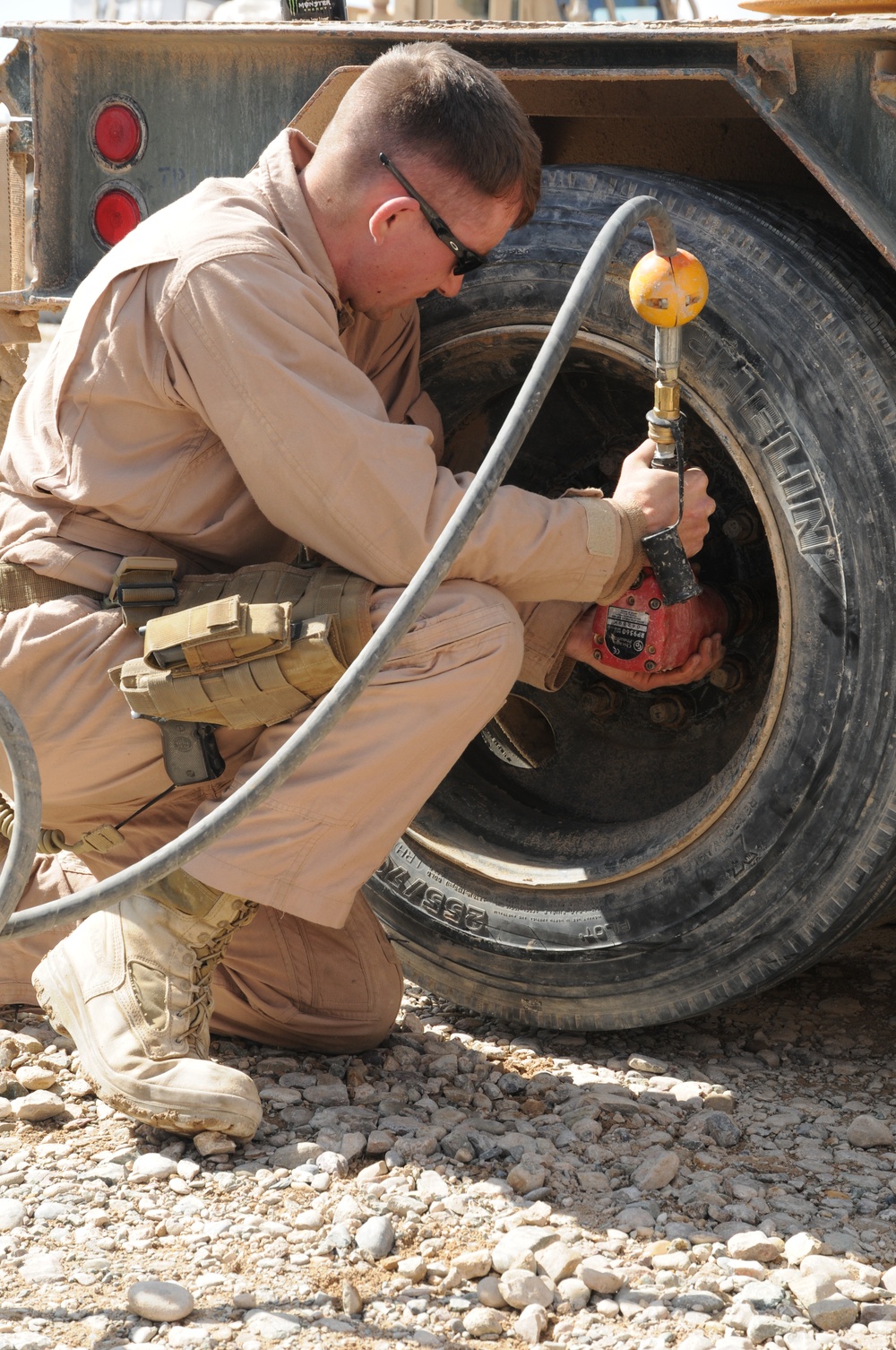 Seabee Replaces a Tire