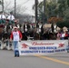 Participants march in the Anheuser-Busch Washington's Birthday Parade in Laredo