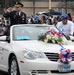 Participants march in the Anheuser-Busch Washington's Birthday Parade in Laredo