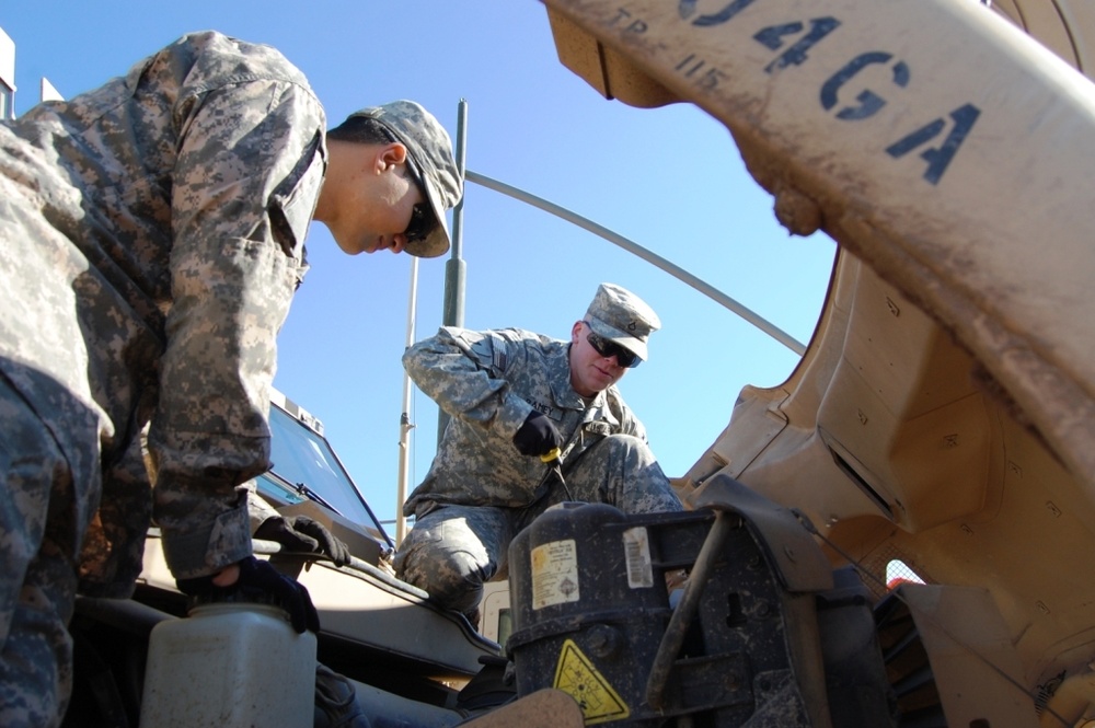 ‘Vanguard’ Battalion mechanics work on MRAPs at Camp Taji