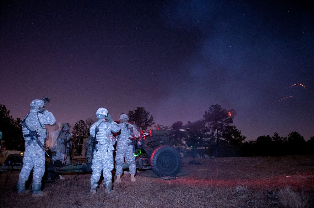 Airborne artillery unit fires live rounds during mass training exercise