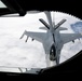 185th KC-135 performs aerial refueling of 132nd F-16s during deployment in Australia.